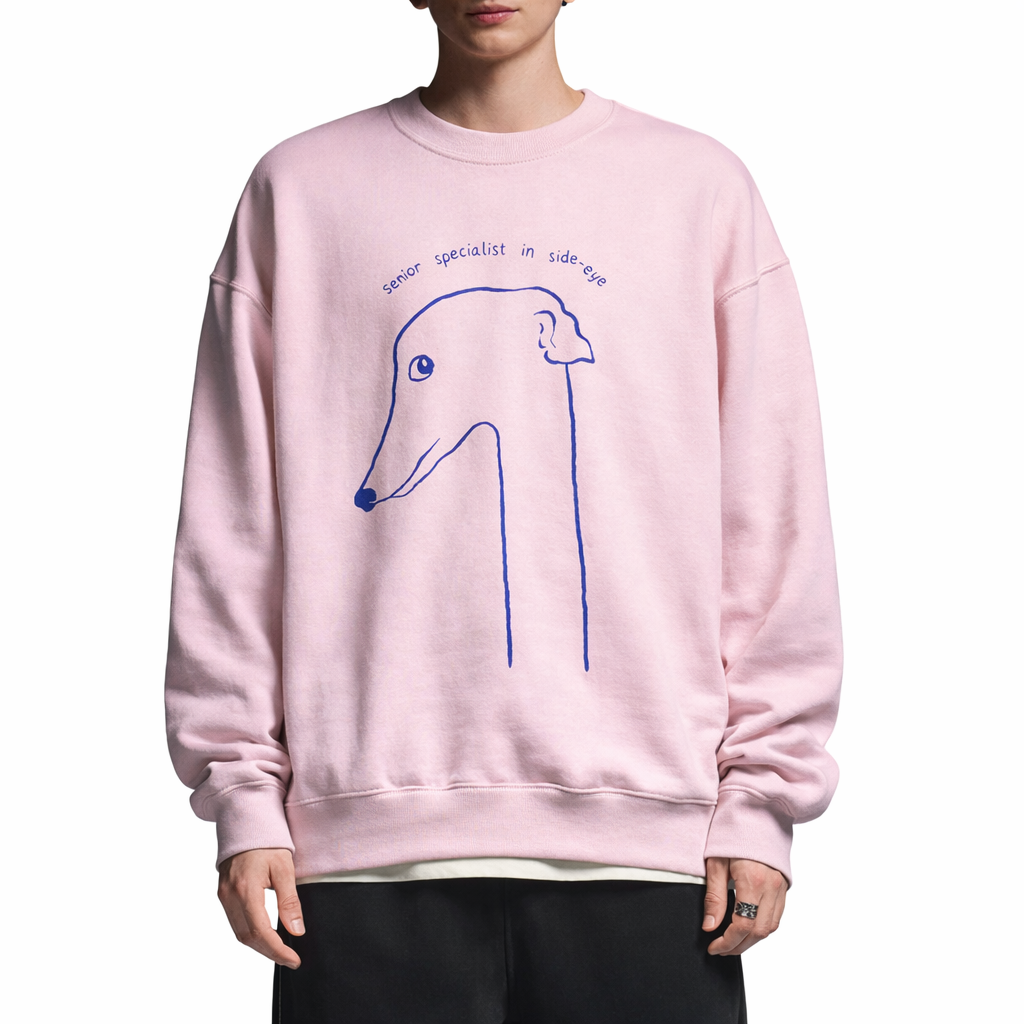 Greyhound illustration pink sweatshirt with side eye graphic worn by model