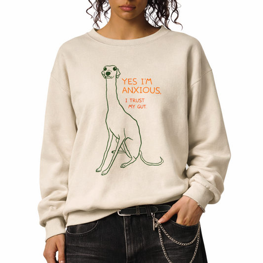 Greyhound minimal illustration sweatshirt with “Yes I’m Anxious” text worn by model